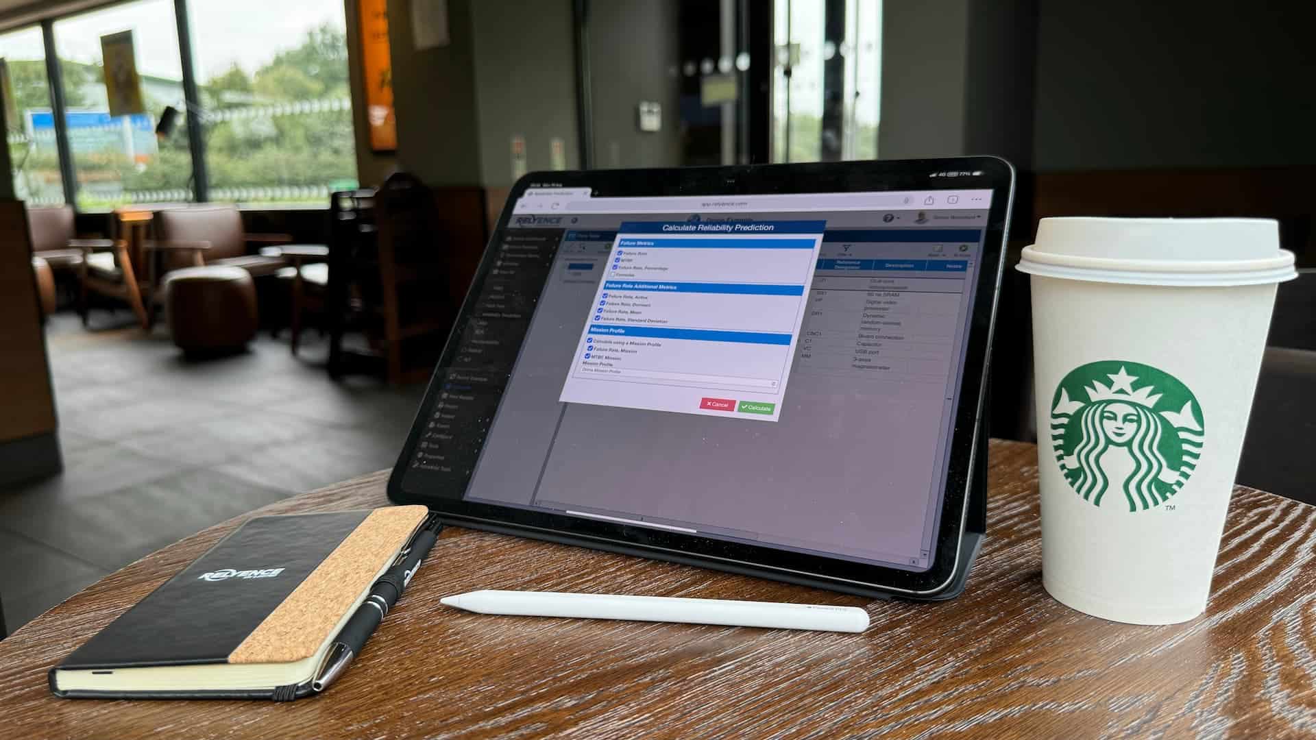Reliability Prediction Calculations shown on an ipad pro in a coffee shop